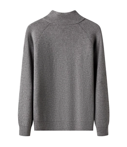 Detail view of dark grey knitted cardigan featuring a distinct vertical ribbed texture