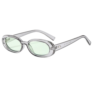 Retro oval sunglasses in translucent grey frame and light green lenses with UV400 protection