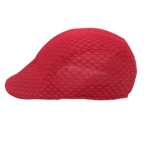 Detail of red breathable mesh fabric and honeycomb texture on a lightweight flat cap
