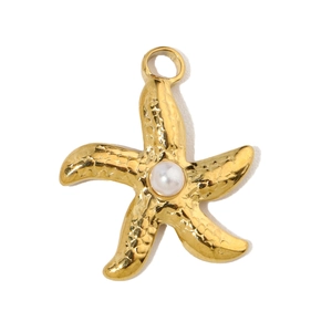 Detailed view of a golden starfish pendant with a white pearl and hammered metal texture