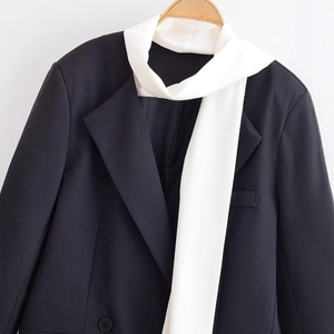 Women's black blazer jacket with white scarf collar and double-breasted detail