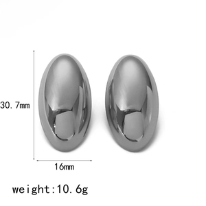 Detail view of oval stud earrings with 30.7mm height and 16mm width measurements