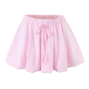 Detail of pink striped pumpkin shorts featuring elastic waist and decorative front bow tie