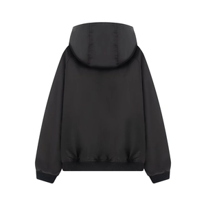 Rear view of black oversized bomber jacket with hooded detail and ribbed hem texture