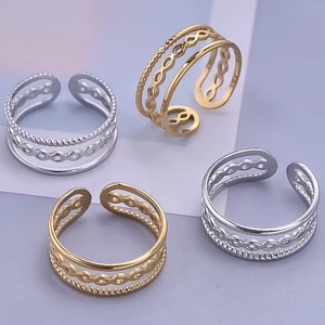 Close-up of triple-layer 304 stainless steel rings with gold and silver braided design