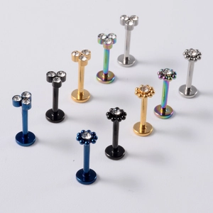Clous d'oreilles à dos plat en acier inoxydable avec cristaux colorés en plusieurs tons