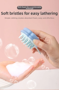 Detail of the silicone scalp massage brush generating rich foam for hair washing