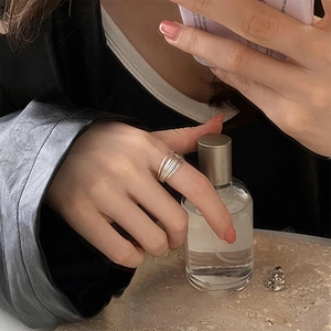 Minimalist silver multilayer wire ring for women with modern geometric layered design