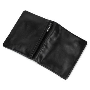 Detailed interior of a genuine leather wallet with a metal zipper compartment on white background