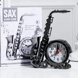 Creative saxophone shaped black alarm clock with quartz movement and retail packaging