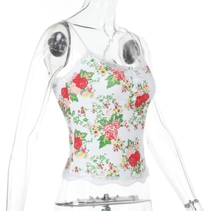 Close-up of floral lace trim camisole with rose pattern and button detailing