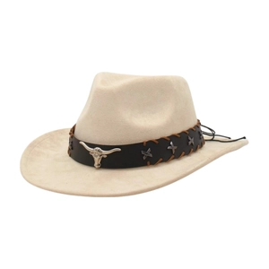 Detailed view of silver bull head emblem and braided band on a cream western cowboy hat