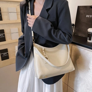 Large cream PU leather tote bag with gold hardware and adjustable strap for women