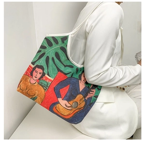 Artistic oil painting tote bag on a white suit model showing a colorful canvas print