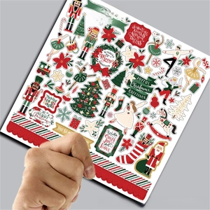 Macro detail of Nutcracker Christmas scrapbook paper with vintage soldiers and festive patterns