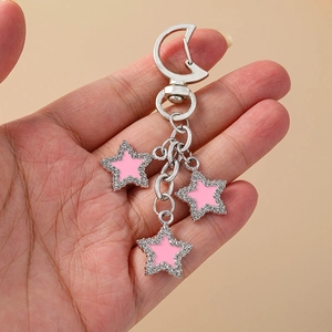 Silver moon keychain with three pink enamel stars and sparkling rhinestones