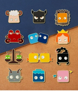 Set of 12 cartoon zodiac enamel pins with cute animal designs and golden metal edges