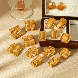 Elegant 18K gold plated stainless steel geometric earrings set in a wooden jewelry box