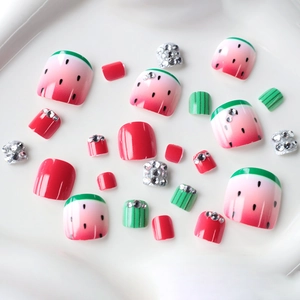 Watermelon theme press-on toenails with green French tips and sparkling rhinestones