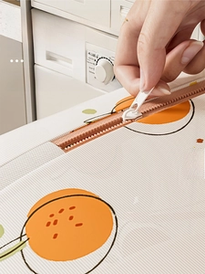 Close-up of fine mesh laundry bag with orange pattern and non-slip zipper for washing machine