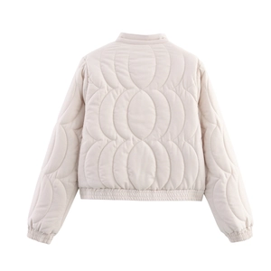 Back view of beige quilted jacket with oval stitched patterns and elastic hem