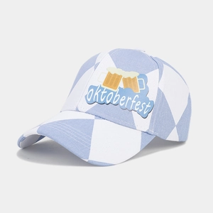 Detail of blue and white checkered baseball cap with Oktoberfest beer mug patch
