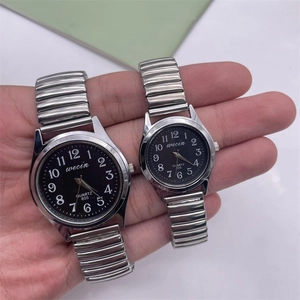 Pair of quartz watches with silver elastic steel bands and black luminous dials