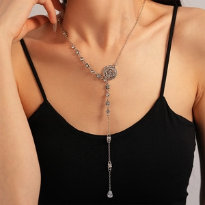 Silver-colored Y-necklace with rose floral pendant and sparkling cubic zirconia crystals
