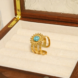 Retro gold plated stainless steel ring featuring sunflower design with turquoise stone
