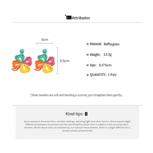 Detailed size chart for handmade raffia grass flower earrings with weave texture specs