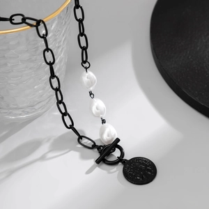Men's necklace with black chain, baroque pearls, and coin pendant with a T-bar toggle clasp