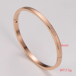 Detail view of 4mm rose gold stainless steel bangle with Love Kiss engraved pattern
