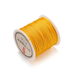 Close-up of yellow 0.8mm polyester cord for DIY handmade Chinese knot weaving