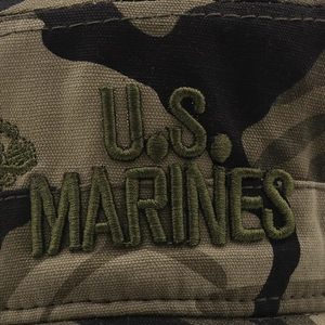 Detail of U.S. MARINES embroidery on woodland camouflage cotton fabric for tactical caps