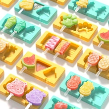 Macro shot of colorful Christmas tree and fruit silicone popsicle molds in various shapes