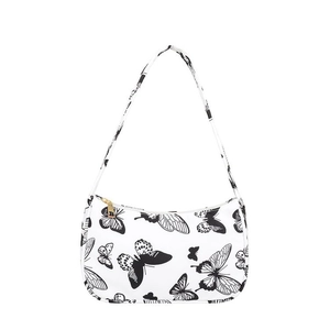 White butterfly print underarm bag with black patterns and vintage shoulder strap style
