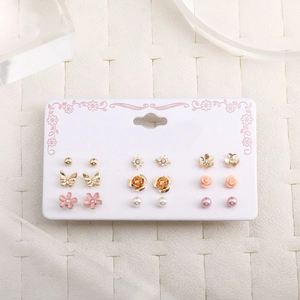 Detailed set of 9 pairs of gold-plated alloy earrings with pearls and butterflies