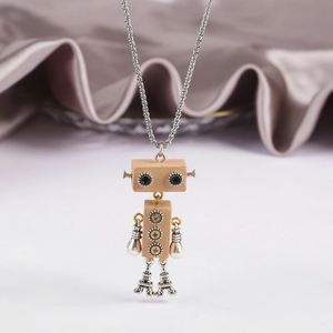 Detailed macro view of the articulated robot pendant with Eiffel Tower shaped legs