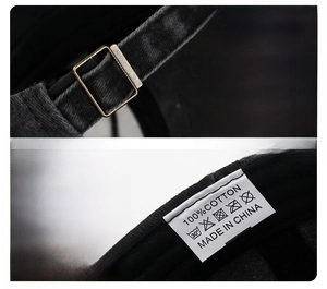 Detail of 100% cotton baseball cap with adjustable gold metal buckle and washing label