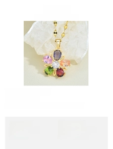 Detail of five-petal flower pendant with colorful cubic zirconia and titanium steel chain