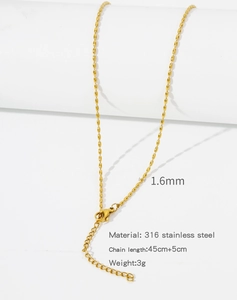 Detail of 1.6mm gold bead chain with lobster clasp and 5cm extension on 316 stainless steel