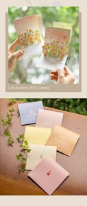 Detailed 3D pop-up flower design inside paper greeting card with gold foil cover