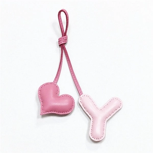 Handmade leather heart and letter Y bag charm with deep pink and light pink details
