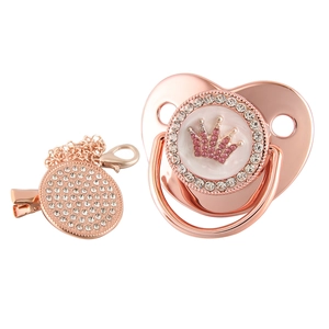Rose gold pacifier set with pink rhinestone crown and matching crystal pacifier clip