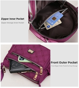 Detailed view of large capacity nylon tote with multiple zipper pockets and quilted pattern