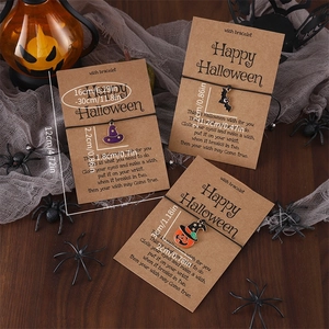 Adjustable Halloween wish bracelets with pumpkin, bat and wizard hat charms and sizing details