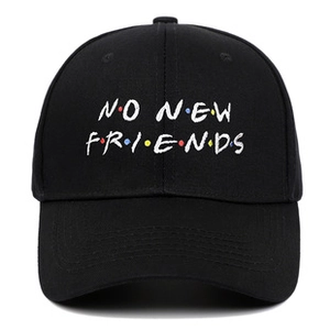 Detail of No New Friends embroidery on a black washed cotton vintage baseball cap