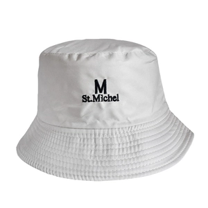 Detailed embroidery of M St. Michel text on a white cotton canvas sun hat fabric