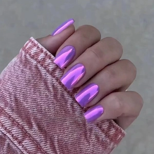 Close-up of square metallic purple mirror chrome press-on nails with a futuristic finish