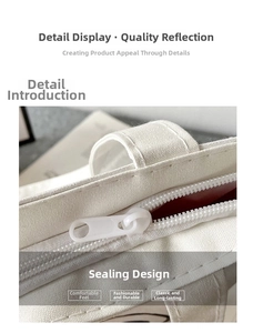 Detail of high-quality nylon zipper closure on white minimalist oxford fabric tote bag